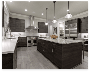 Kitchen with dark wood cabinets, stainless steel appliances, and quartz countertops for zero maintenance.