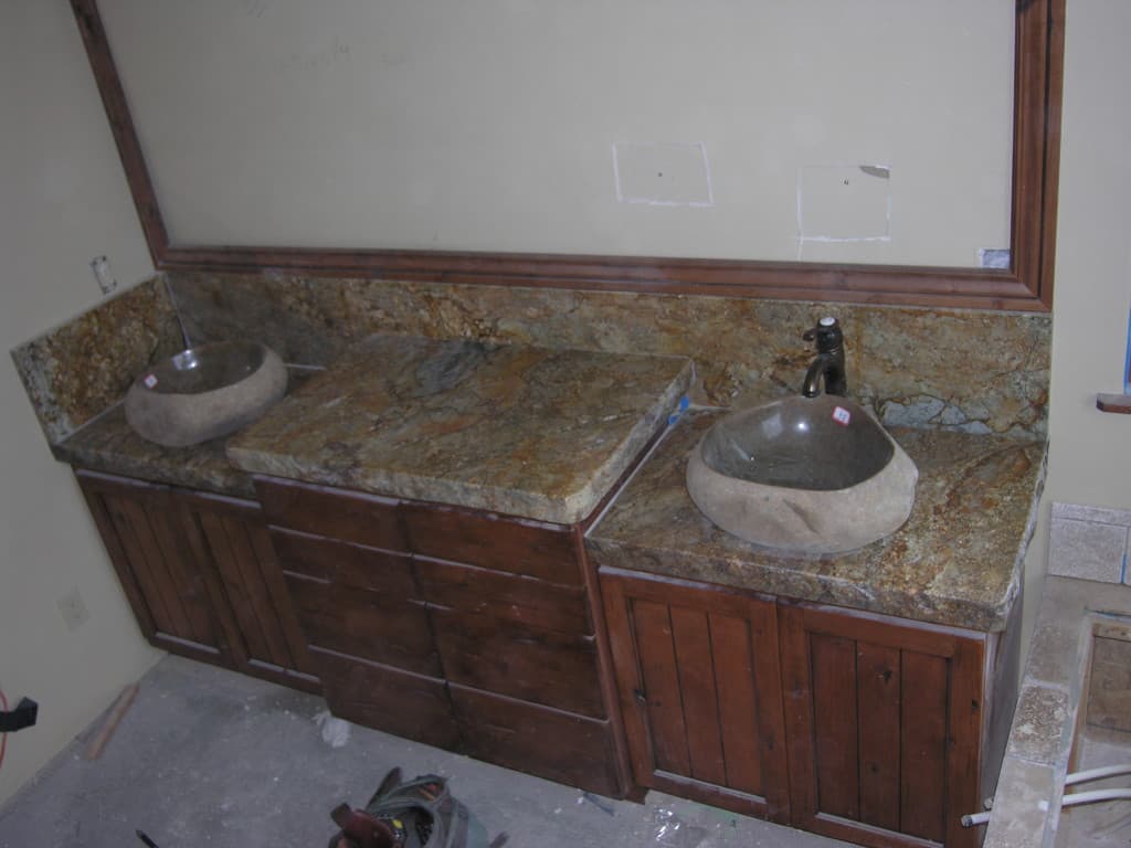 Bathroom with two sinks and mirror in kitchen style.